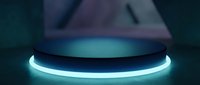 Futuristic dark round podium with glowing cyan neon light ring on reflective floor, perfect for product display and presentation showcase.
