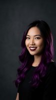 Young Asian woman with vibrant purple hair highlights smiling confidently against dark background for beauty and fashion projects.