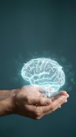 Glowing digital brain hologram floating above cupped hands representing artificial intelligence, innovation, mental health, and cognitive technology concepts.