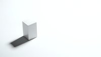 White geometric cube with shadow on clean background for minimalist design projects and modern presentations.