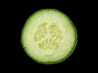 Fresh cucumber slice isolated on transparent background, ready for food design, stickers, print on demand, T-shirts, sublimation, and clipart projects.