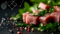 Fresh raw tuna cubes with herbs, peppercorns and spices on dark background. Macro food photography with selective focus and bokeh effect.