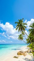 Tropical paradise beach with turquoise water, white sand, palm trees, and rocks under a bright blue sky with clouds.