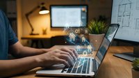 Professional working on laptop with digital technology icons and data visualization overlays in modern office workspace for business productivity.