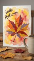 Watercolor autumn greeting card featuring hand-lettered text and vibrant fall leaf illustration with warm yellow, orange, and red tones on white background.