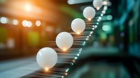 White spheres ascending on metallic lines with glowing light effects and bokeh background create futuristic minimalist composition for technology concepts.