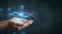 Digital DNA helix hologram floating above open palm, representing genetic engineering, biotechnology innovation, and scientific research for medical and technology applications.