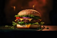 Juicy cheeseburger with fresh vegetables and sesame bun on dark background with dramatic lighting and smoke effect, appetizing fast food photography.