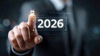 Male hand touching glowing 2026 number with futuristic interface and robot icon. Digital transformation and artificial intelligence concept for business innovation.