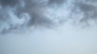 Dramatic stormy sky with dark gray clouds and moody atmosphere for weather backgrounds and nature photography projects.