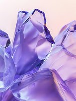 Purple crystal formations with translucent faceted surfaces creating abstract geometric patterns for luxury design and modern decor applications.