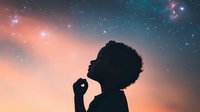 Silhouette of African American woman with natural hair against starry night sky and sunset, contemplative pose looking upward with dreamy cosmic atmosphere.