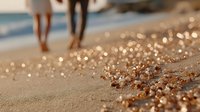 Couple walking barefoot on golden sandy beach at sunset with sparkling water reflections creating romantic atmosphere for vacation and travel concepts.