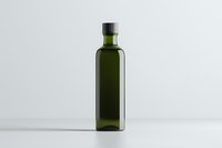 Green glass bottle isolated on white background, minimalist composition with clean lines and simple form. Suitable for olive oil, vinegar packaging design.