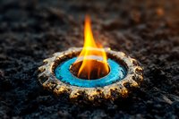 Bright orange flame emerging from circular turquoise ring against dark textured background, creating dramatic contrast and mystical atmosphere for spiritual concepts.
