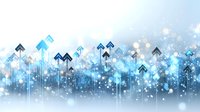 Glowing blue arrows pointing upward against light background with sparkles and bokeh effects create dynamic business growth visualization pattern.