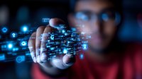 Digital transformation concept showing Asian male hand interacting with futuristic holographic interface displaying data analytics and network connections in blue glow.
