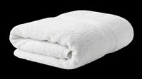 Folded white fluffy bath towel isolated on transparent background, ready for design use in clipart, stickers, print on demand, and sublimation projects.
