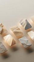 Geometric stone and wooden blocks arranged in flat lay composition with warm studio lighting and shadows on neutral beige background for design projects.