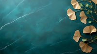 Golden ginkgo leaves branch on dark emerald marble background creates elegant contrast for luxury design and wellness projects.