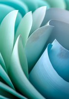 Soft curved petals in gentle turquoise and mint tones create an abstract macro composition with smooth gradients and organic flowing lines. Suitable for wellness and spa designs.