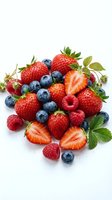 Fresh mixed berries with strawberries, blueberries and raspberries isolated on white background for healthy eating and cooking projects.