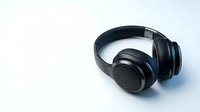 Modern black wireless headphones on clean white background isolated for music technology and audio equipment design projects.