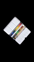 Watercolor paint set in open metal tin with colorful pans and brushes, isolated on transparent background. Great for art supply clipart, stickers, and t-shirt design.