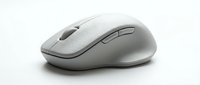 Sleek gray wireless computer mouse isolated on white background, modern ergonomic design for office and technology concepts.
