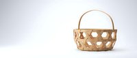 Empty woven bamboo basket with handle on white background, natural eco-friendly storage container for home organization and rustic decor.
