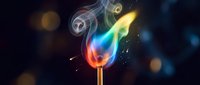Colorful flame with swirling smoke and sparks on dark background. Abstract fire element with rainbow colors and glowing particles for creative designs.