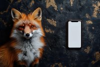 Red fox portrait next to blank white smartphone screen on dark textured background with golden elements, mockup for digital product presentation.