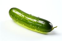 Fresh green cucumber with water drops on glossy surface isolated on white background, ready for healthy eating and food design projects.