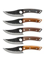 Set of five handcrafted hunting knives with hammered steel blades and wooden handles, isolated on white background for outdoor enthusiasts and collectors.