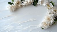 White chrysanthemum flowers with green leaves arranged in corner frame on textured white background, creating elegant floral composition for wedding and celebration designs.