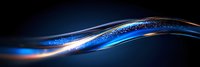 Luminous flowing wave with glowing blue and orange light effect against dark background, sparkling particles creating dynamic motion streak pattern.