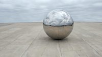 Reflective metallic sphere on cracked concrete surface with cloudy sky, representing abstract concepts of technology, innovation, and surreal environments for design projects.