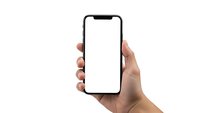 Hand holding modern smartphone with blank white screen isolated on white background for mobile app mockup and digital technology presentation.