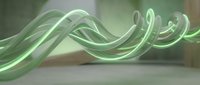 Green flowing energy waves with smooth curves and light effects on blurred background for modern digital design and motion graphics projects.