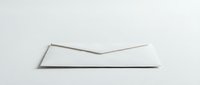 White blank envelope opened and unfolded on clean background for correspondence, mailing, communication and office supplies mockup design projects.
