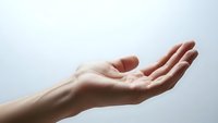 Open female hand palm up in receiving gesture against clean white background isolated for design and commercial use.