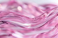 Flowing pink liquid waves create smooth curved lines with soft bokeh highlights in abstract macro photography, suitable for beauty and cosmetic industry backgrounds.