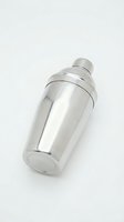 Stainless steel cocktail shaker with cap and strainer, isolated on white background for bartending and mixology applications.