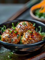 Glazed meatballs with sesame seeds and fresh herbs in cast iron skillet, homemade comfort food ready for dinner service and restaurant menu photography.