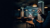 Professional businessman analyzing financial data on transparent digital tablet interface in modern office environment for business analytics.