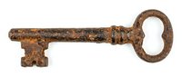 Antique rusty iron skeleton key with ornate handle and aged patina, isolated on white background for design, clipart, and vintage decor projects.