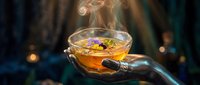Mystical dark hand holding a glass bowl of steaming herbal tea with flowers, magical atmosphere, witchcraft aesthetic, wellness ritual.