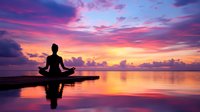 Silhouette of woman meditating in lotus position on wooden pier during vibrant purple and orange sunset over calm ocean waters, reflecting peaceful sky.