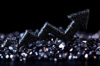 Glittering black arrow shape on dark background with sparkling bokeh lights, representing financial growth and market success trends in business concept.
