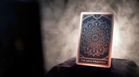 Mystical tarot card The High Priestess glowing with ethereal light on dark stone surface with smoky atmospheric background for spiritual readings.